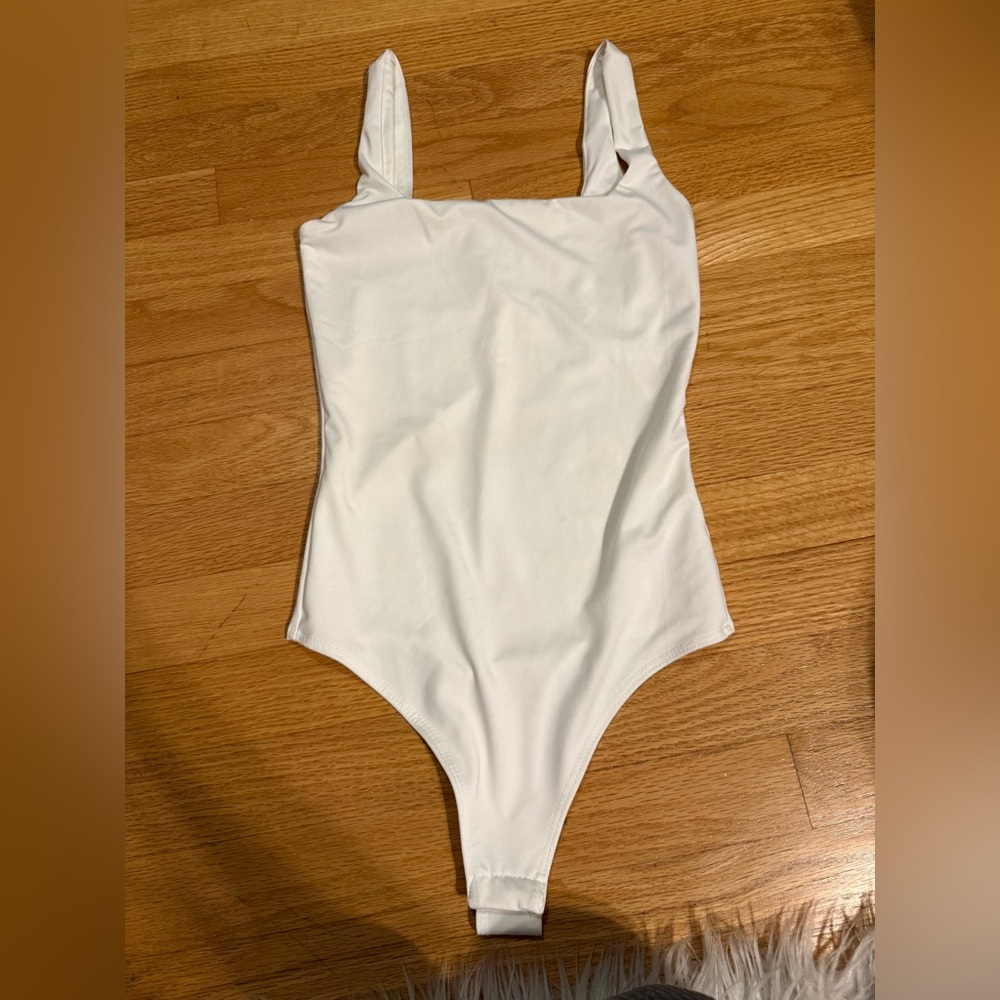 white bodysuit